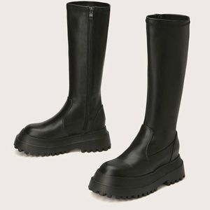 Black chunky knee high platform boots